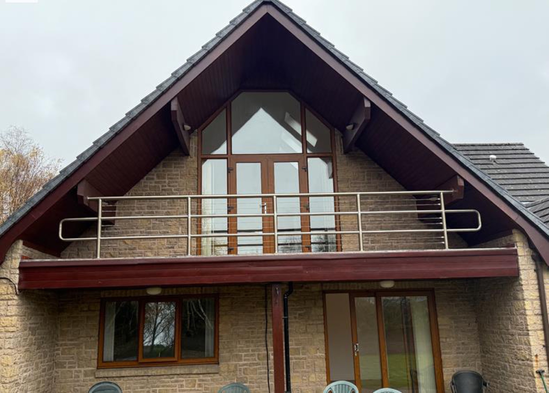 The Balcony: Before, the old railed balcony on the same gable