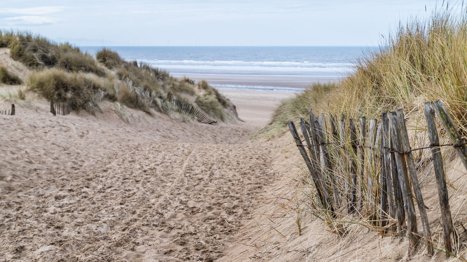 The sandy path through the high dunes down to Formby beach