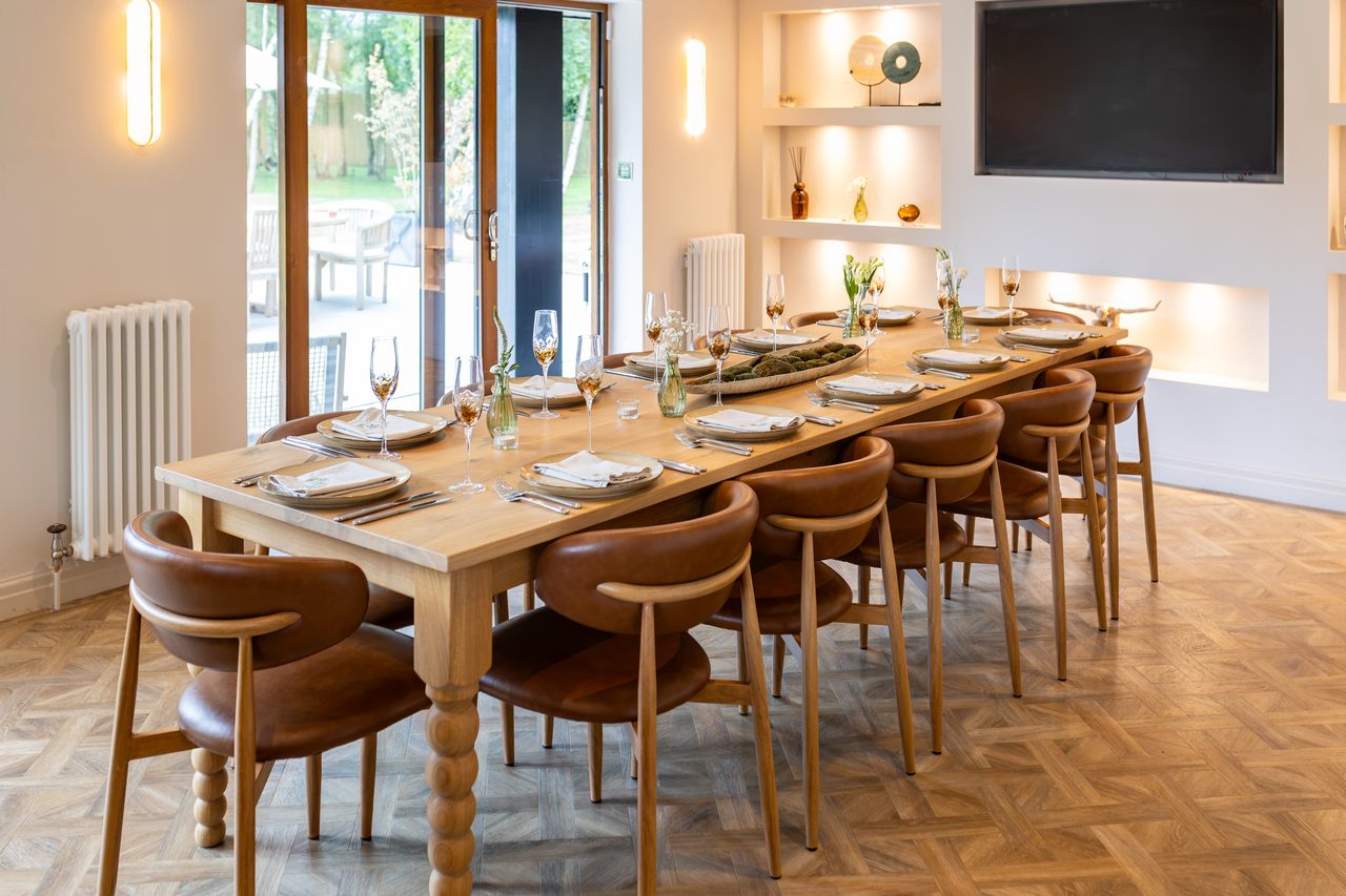 The Warren House dining room set for a celebration dinner