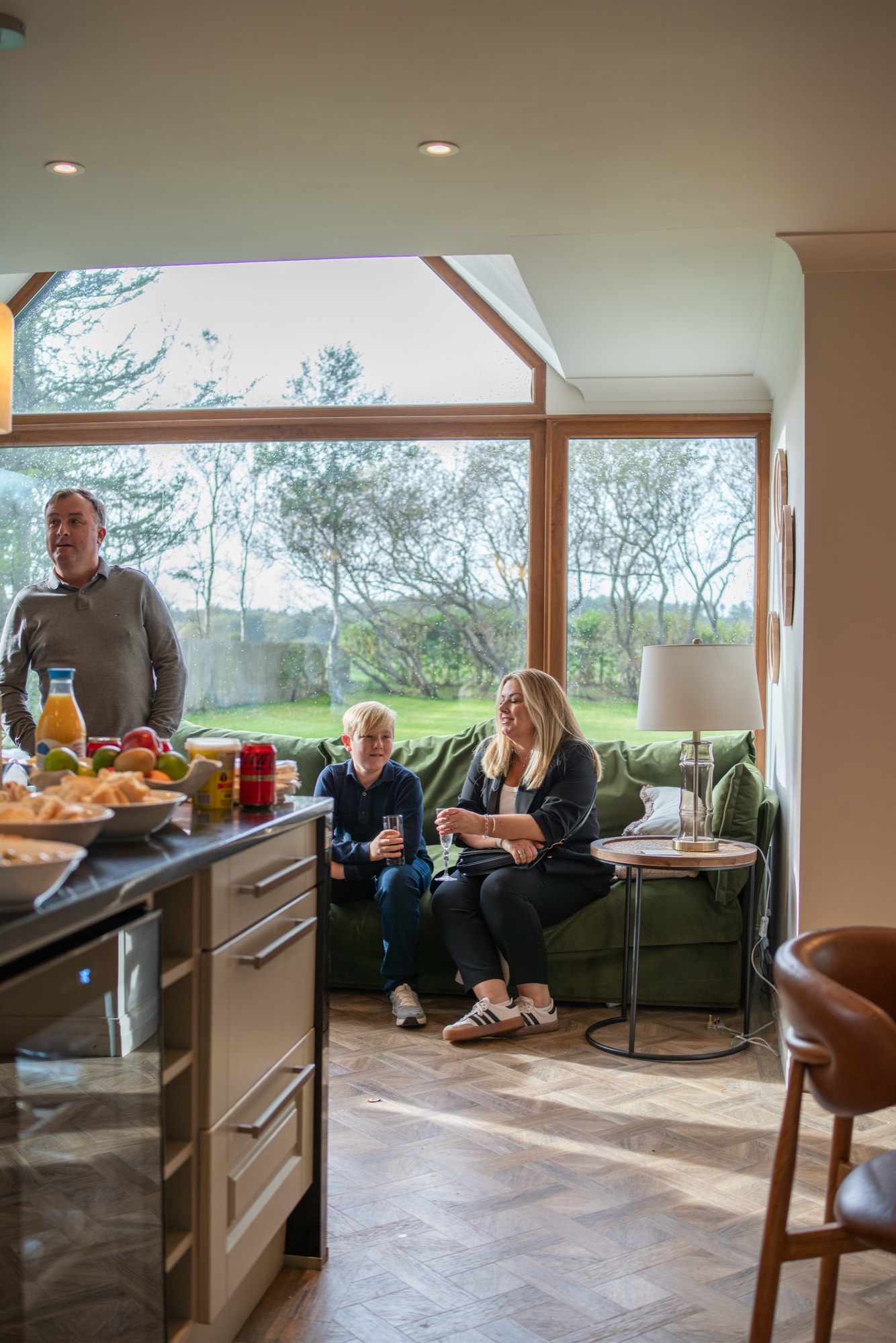 The family cooking together in the Warren House kitchen
