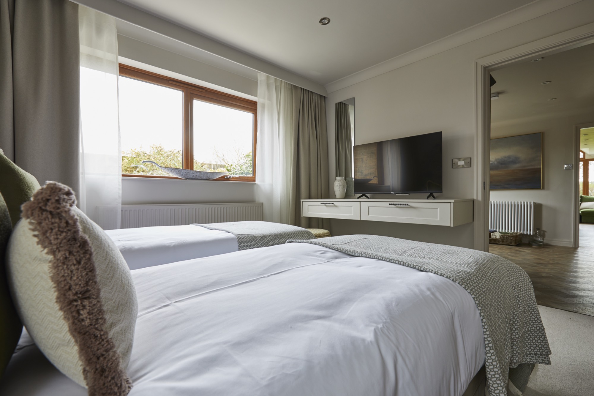 The Woodland Room at Warren House, a flexible king or twin bedroom set apart from the rest of the house